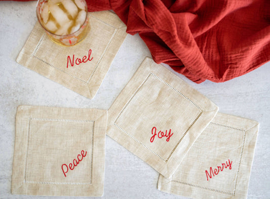 Holiday Word Linen Coasters, set of four: Red